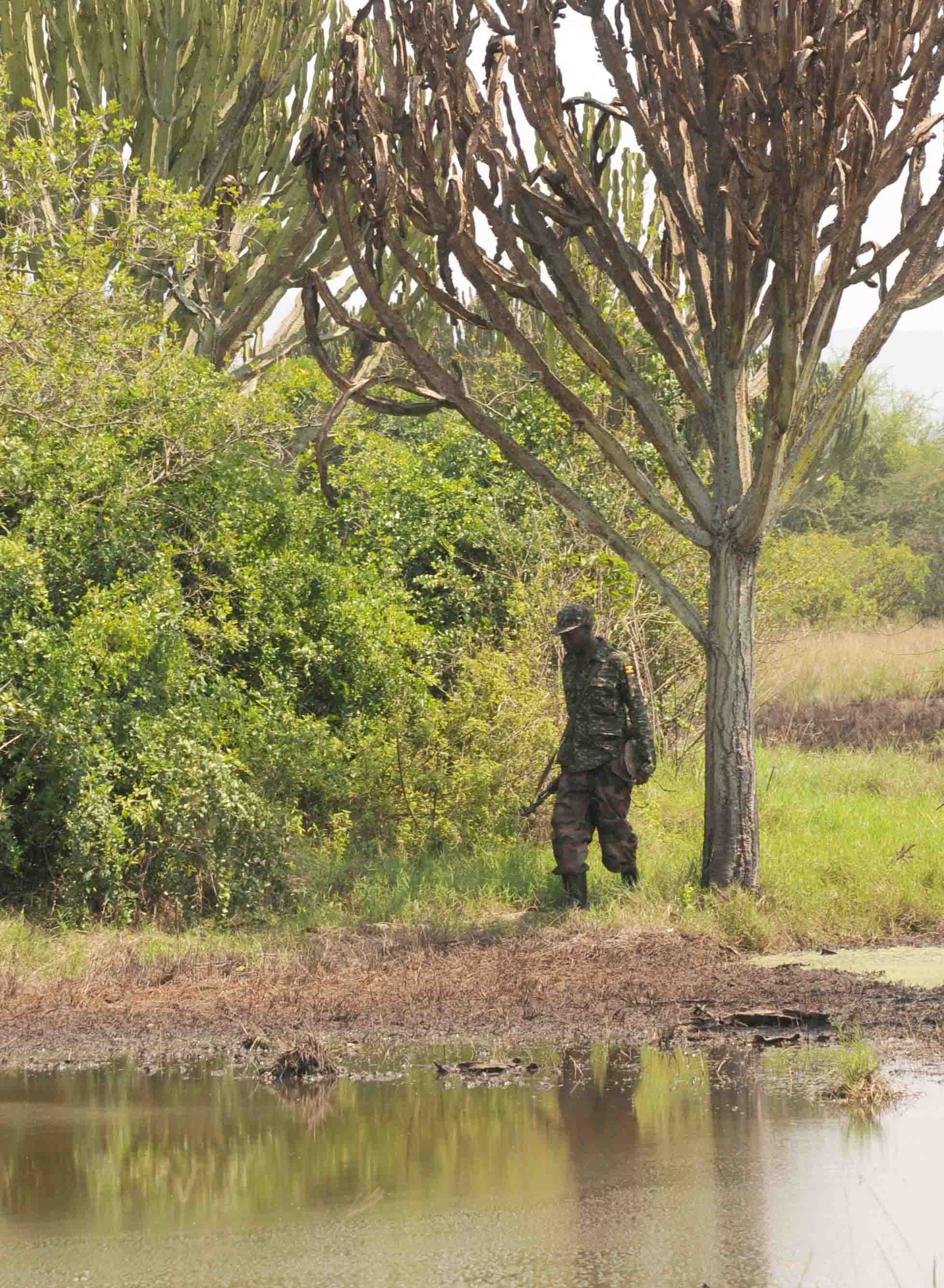 Image: Patrol at a waterhole (credit: Dr Andrew Plumptre, Wildlife Conservation Society)